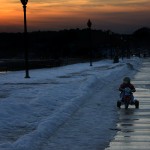 riding his trike down the boulevard